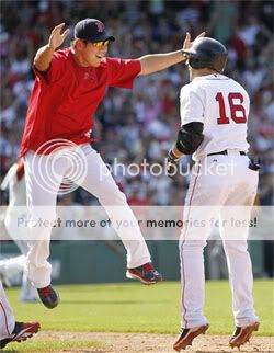 The rare Daisuke Matsuzaka celebration shot. The even-rarer missed jump hug celebration. (AP)